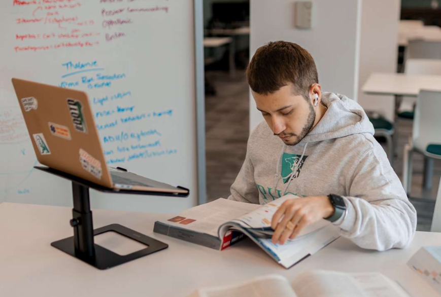 A student completes a remote healthcare training through an online program