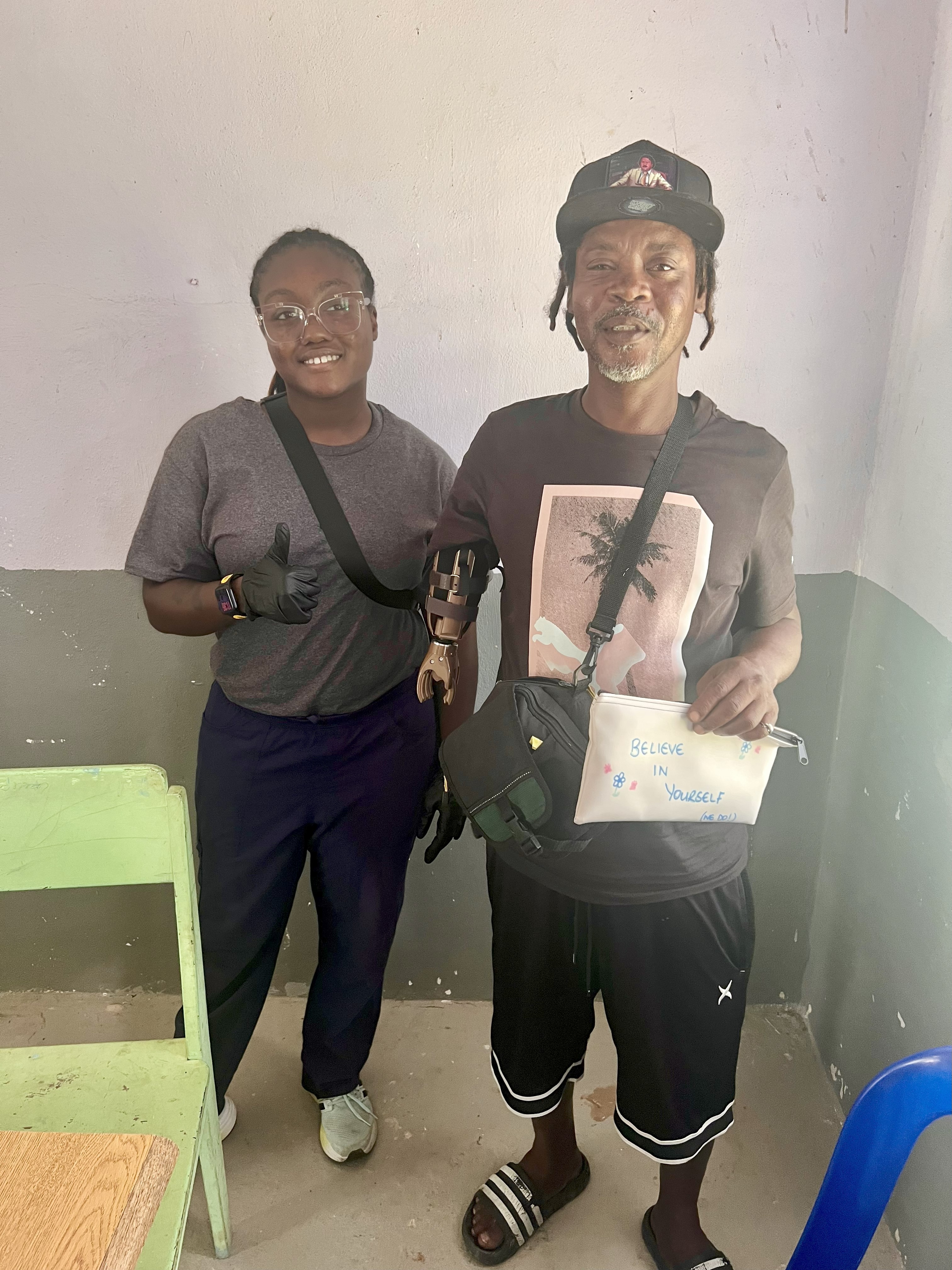 MSMS grad poses with prosthetic patient